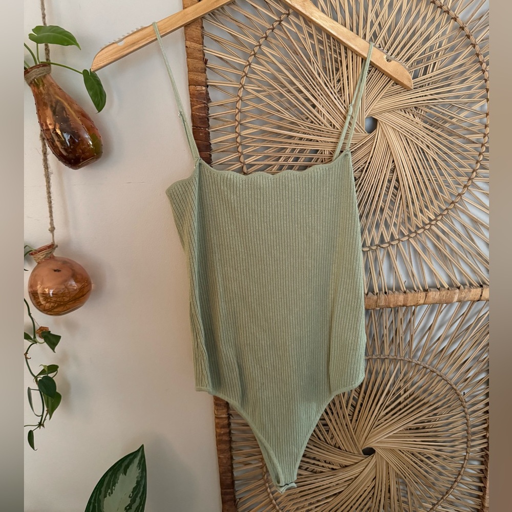 Green scallop edge body suit